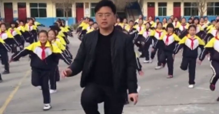Chinese School Principal Dances With Students