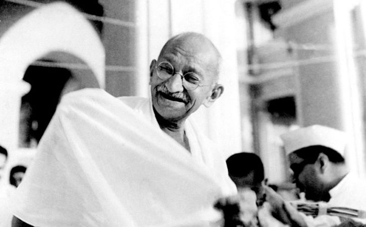 Gandhi laughing
