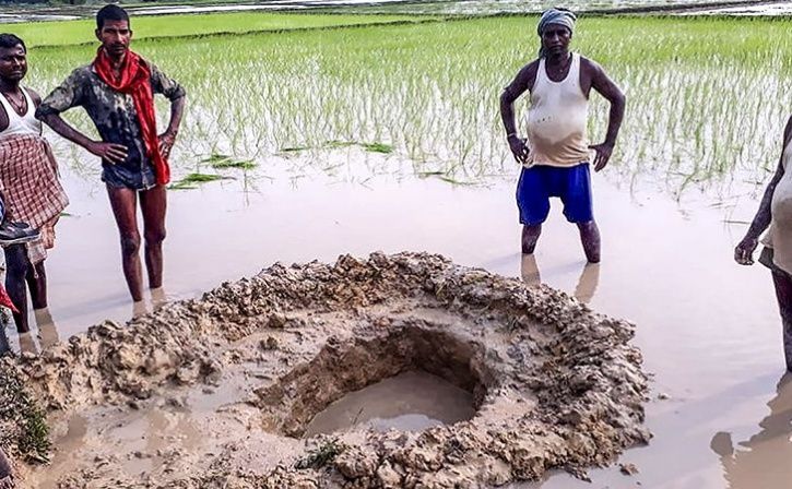 India Farmers Shocked As Suspected Meteorite Crashes Into Rice Field