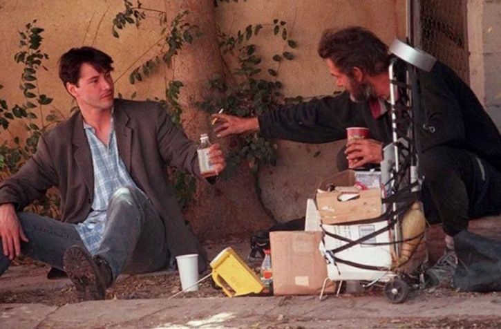 Keanu Reeves with homeless man.