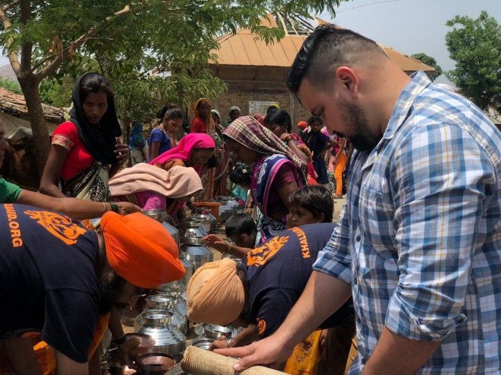 Randeep Hooda joins khalsa aid to provide drinking water to the people drought hit Vele village. 