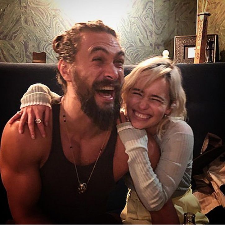 Emilia Clarke says Jason Momoa helped her during nude scenes on Game of Thrones.