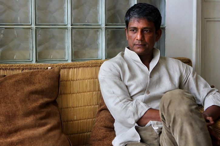 A picture of Adil Hussain.