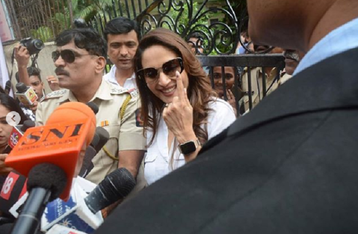 Madhuri Dixit also posed for the paps after she casted her vote in Bandra.