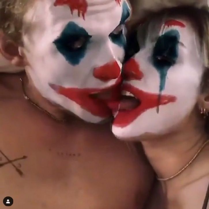 Miley Cyrus & Cody Simpson Kiss And Cuddle Using A Joker Filter & It’s Messing With Our Heads