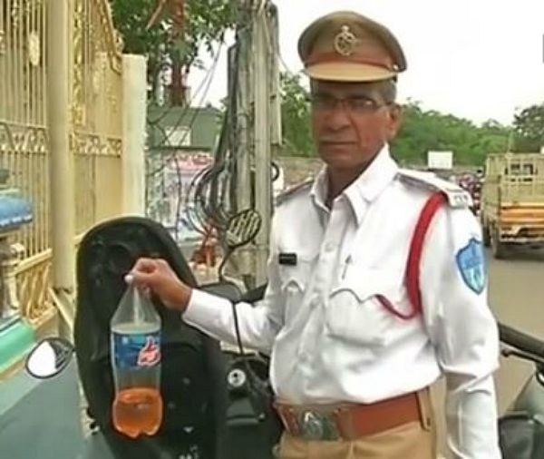Meet The Hyderabad Traffic Cop Who Gives Away Free Petrol To Stranded Motorists