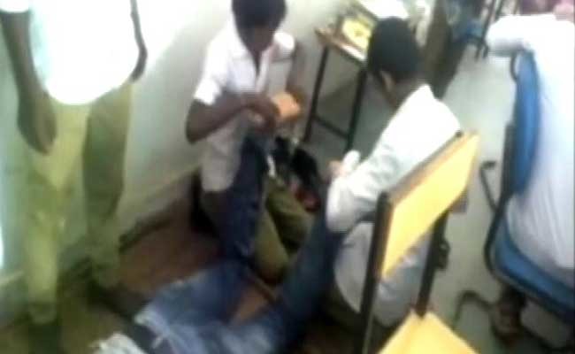 OMG! Chhattisgarh Teacher Gets Foot Massage From Students
