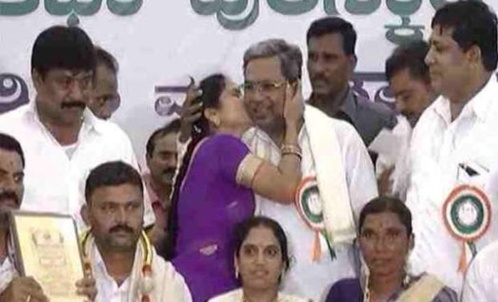 Peck On Cheek Leaves Karnataka CM Embarrassed