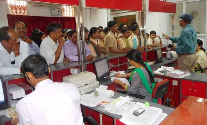 Unsung Heroes: Bank Staff Work Overtime To Manage Cash Flow