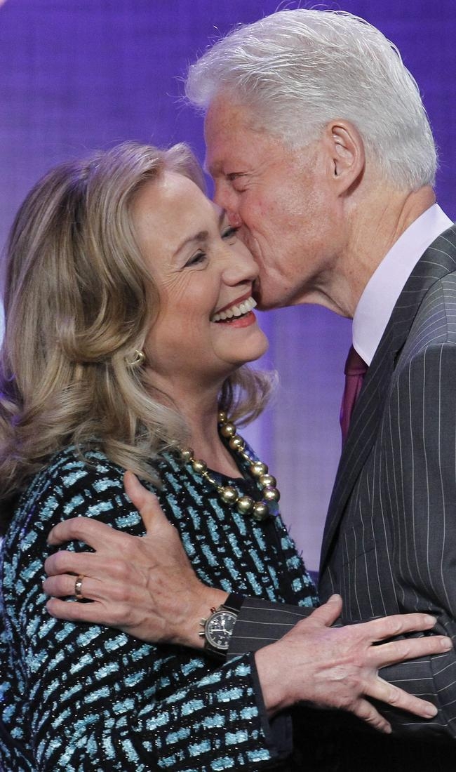 Bill And Hillary Embrace Each Other Onstage