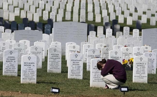 The man was passing through a cemetery.