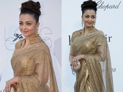 Cannes 2013: Aishwarya Goes Glam In Gold