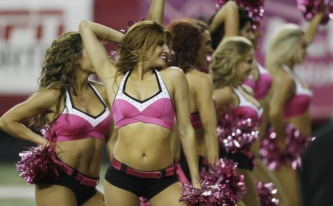 Atlanta Falcons cheerleaders and mascot Freddy Falcon celebrate the News  Photo - Getty Images