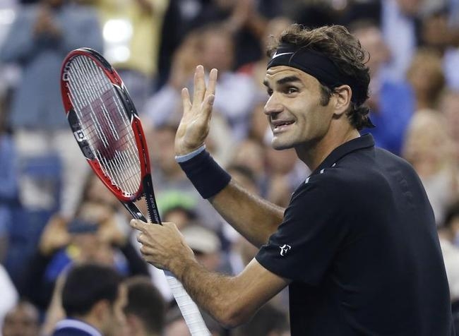 Roger Federer of Switzerland celebrates defeating Sam Groth of Australia in their men's singles match at the 2014 U.S. Open tennis tournament in New York Roger Federer of Switzerland celebrates defeating Sam Groth of Australia in their men's singles match at the 2014 U.S. Open tennis tournament in New York