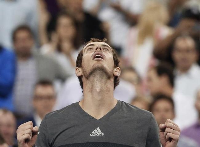 Andy Murray of Britain looks up and celebrates after defeating Matthias Bachinger of Germany in their match at the 2014 U.S. Open tennis tournament in New York Andy Murray of Britain looks up and celebrates after defeating Matthias Bachinger of Germany in their match at the 2014 U.S. Open tennis tournament in New York