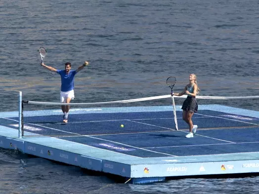 Eugenie Bouchard and Bulgarian ATP player Grigor Dimitrov played an exhibition match on a floating court of the Mexican Open
