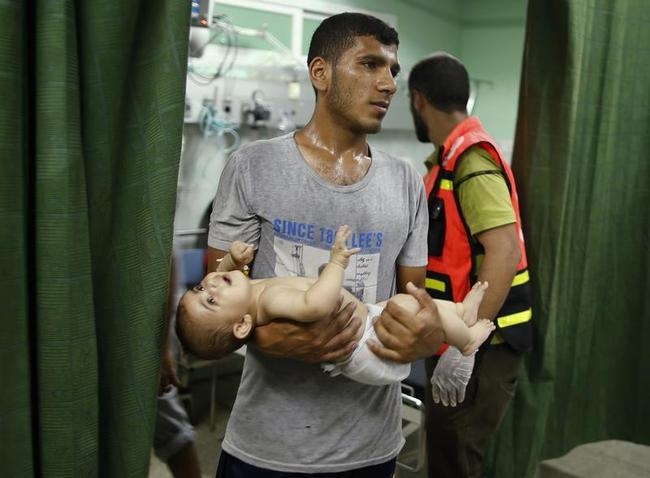 PICS: Israel Strikes UN School In Gaza