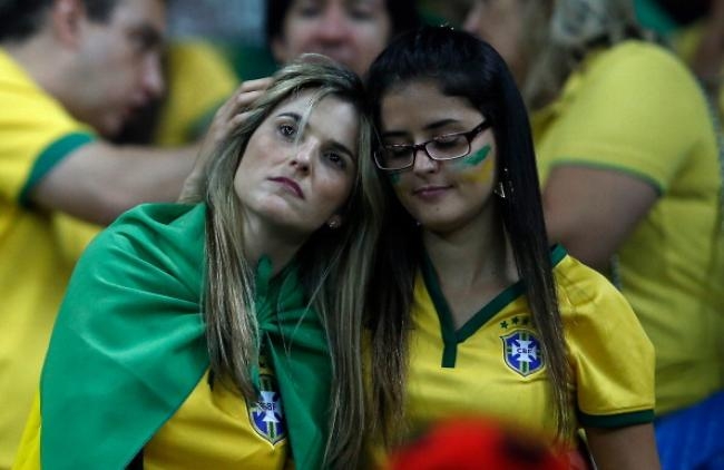 FIFA World Cup 2014: Shocked Fans in Tears after Brazil's Semifinal Humiliation FIFA World Cup 2014: Shocked Fans in Tears after Brazil's Semifinal Humiliation