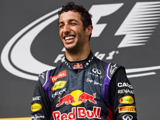 Australian Daniel Ricciardo charged to a thrilling Hungarian Grand Prix victory on Sunday, his second Formula One win for Red Bull, as a drenched track caused chaos among world championship leaders.