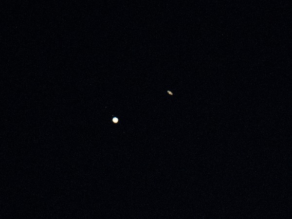 Jupiter (L) and Saturn (R) are seen during the 'Great Conjunction'