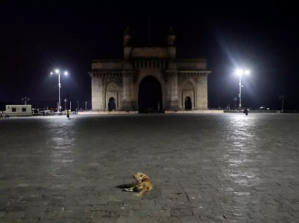 The Gateway of India wears a deserted look following the night curfew imposed by the authorities due to the rise in COVID-19 cases in Mumbai