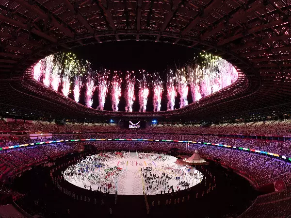 Belated and beleaguered, the virus-delayed Tokyo Summer Olympics finally opened Friday night with a dazzling display of fireworks.