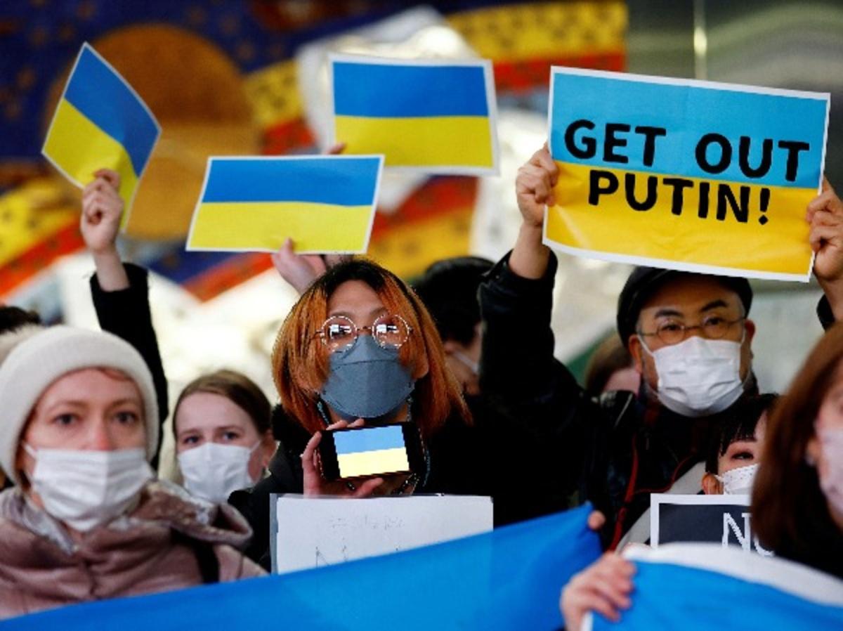 Japanese and Ukrainian protesters attend a rally against Russia's invasion of Ukraine, in Tokyo, Japan.