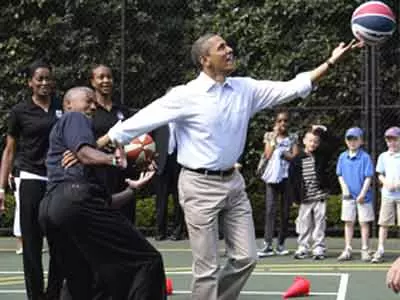 President Obama shoots a basket at Easter Egg Roll