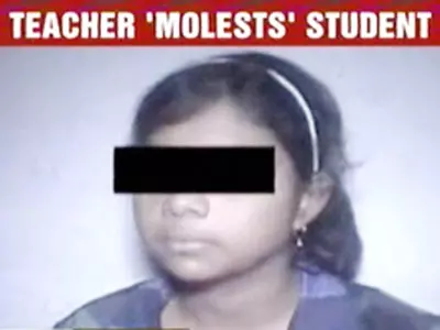 Principal accused of molesting student