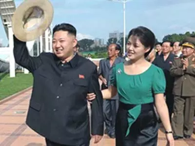 NKorean leader Kim Jong Un steps out with his new wife