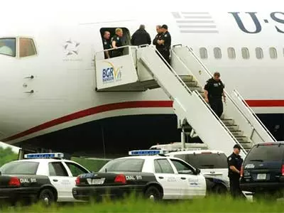 US Airways jet diverted after suspicious note