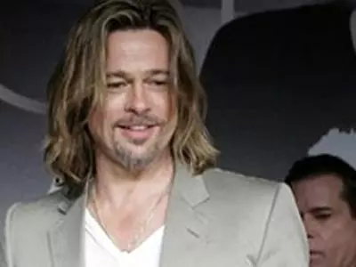 Brad Pitt dispels wedding date rumors at Cannes