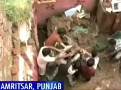 Infant buried alive as building collapses in Amritsar