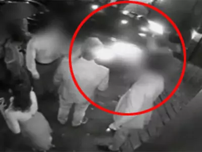 Surveillance video: Lohan-pedestrian encounter at NY club