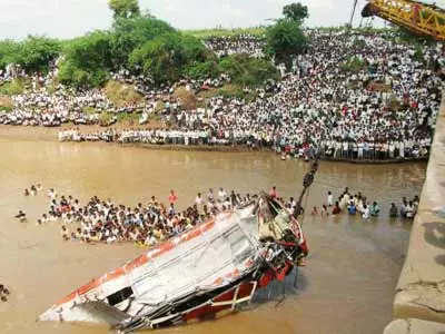 Bus falls into river