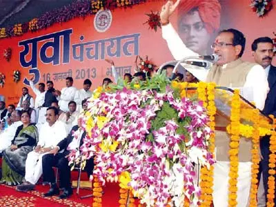 MP CM woos youth with free laptops, opposition cries foul