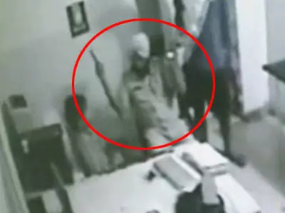 Caught on CCTV: Drunk cop fires at doctor