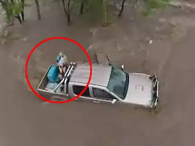 Dramatic video: Baby, mom rescued from flood