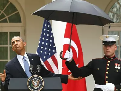 Marines Shield Obama From Rain