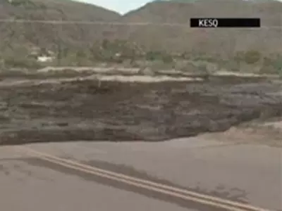 Massive Mud Flow Swallows Desert Road