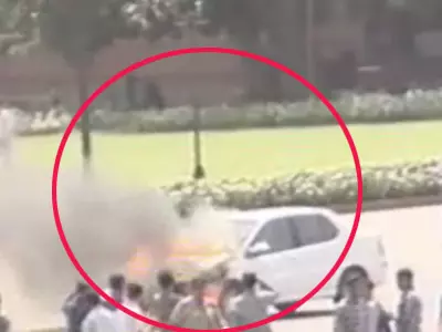 Car Catches Fire Near Parliament