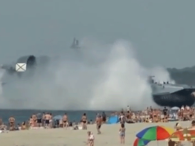 Russian Hovercraft Lands On Busy Beach!